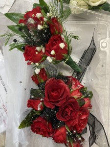 Red and black Wrist corsage and Boutonniere