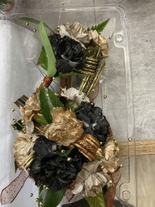Black and Gold wrist corsage and boutonniere